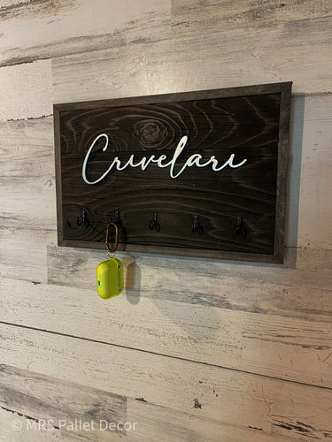 Key holder with hooks